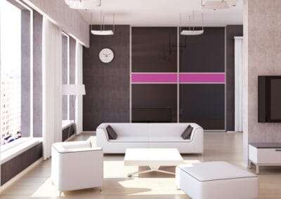Studio apartment with black glass sliding doors, sofa, lighting curtains and window